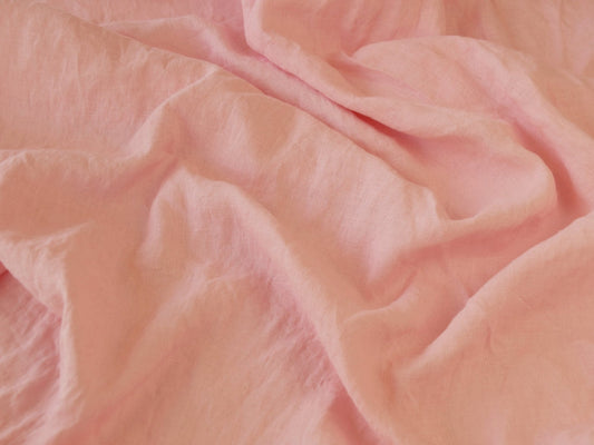 Close-up of pink fabric with ruffled texture